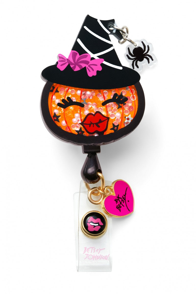 koi Betsey Johnson Witch Pumpkin Badge Reel with retractable cord and snap badge holder at Parker's Clothing & Scrubs.