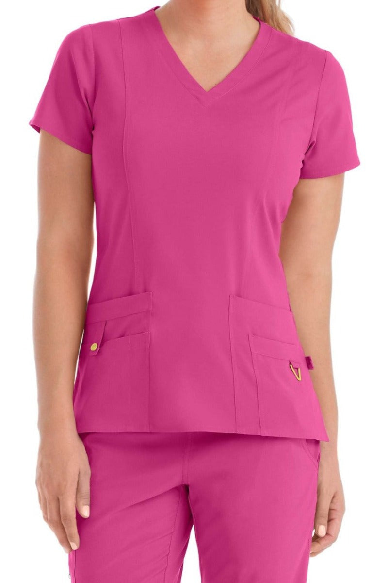 Med Couture Activate V-Neck Top in Pink Punch at Parker's Clothing & Scrubs.