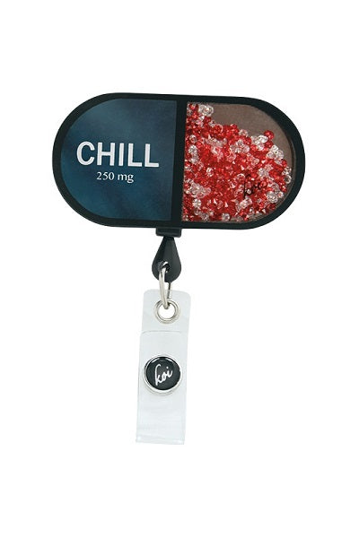 Koi Chill Pill Badge Reel with retractable cord and snap badge holder at Parker's Clothing & Scrubs.