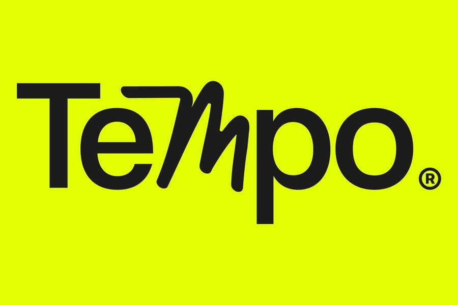 Tempo scrubs logo in black on a bright lime-green background.