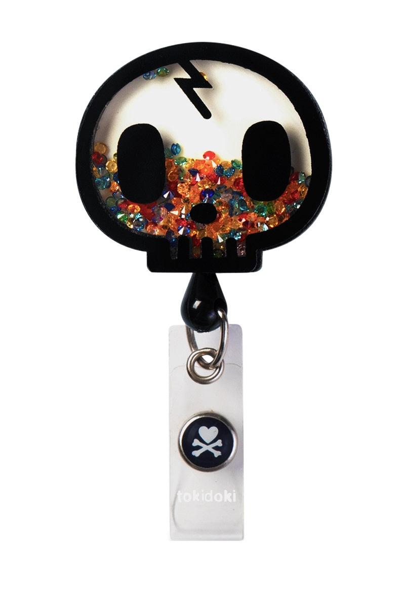 Koi Tokidoki Skull Shaker Badge Reel with retractable cord and snap badge holder at Parker's Clothing and Shoes.