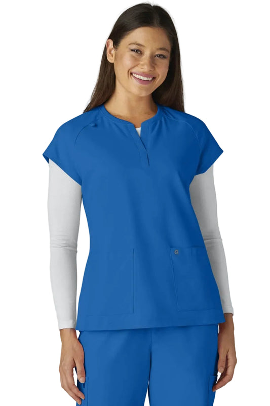 koi C102 Cureology Reese Scrub Top with soft rib-knit collar, raglan sleeves & functional pockets in Royal Blue.