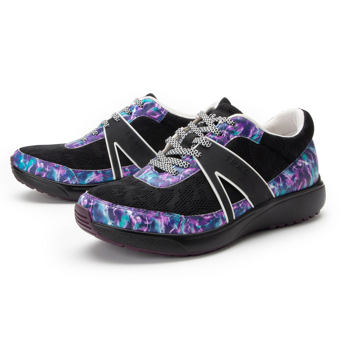 Pair of black and purple patterned shoes on a white background
