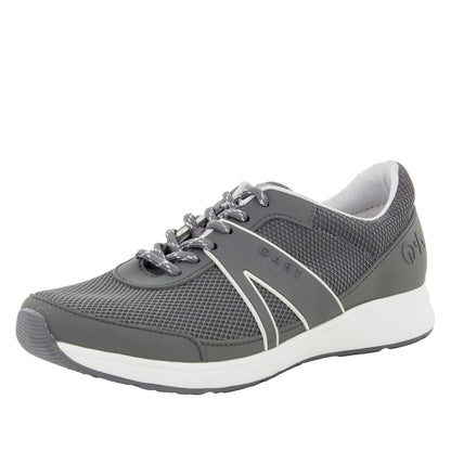 Gray athletic shoe with white sole on a white background