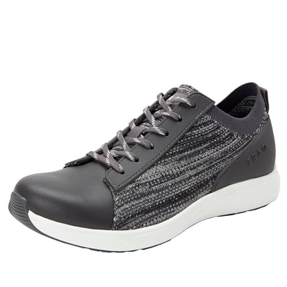 Gray athletic shoe with white sole on a white background
