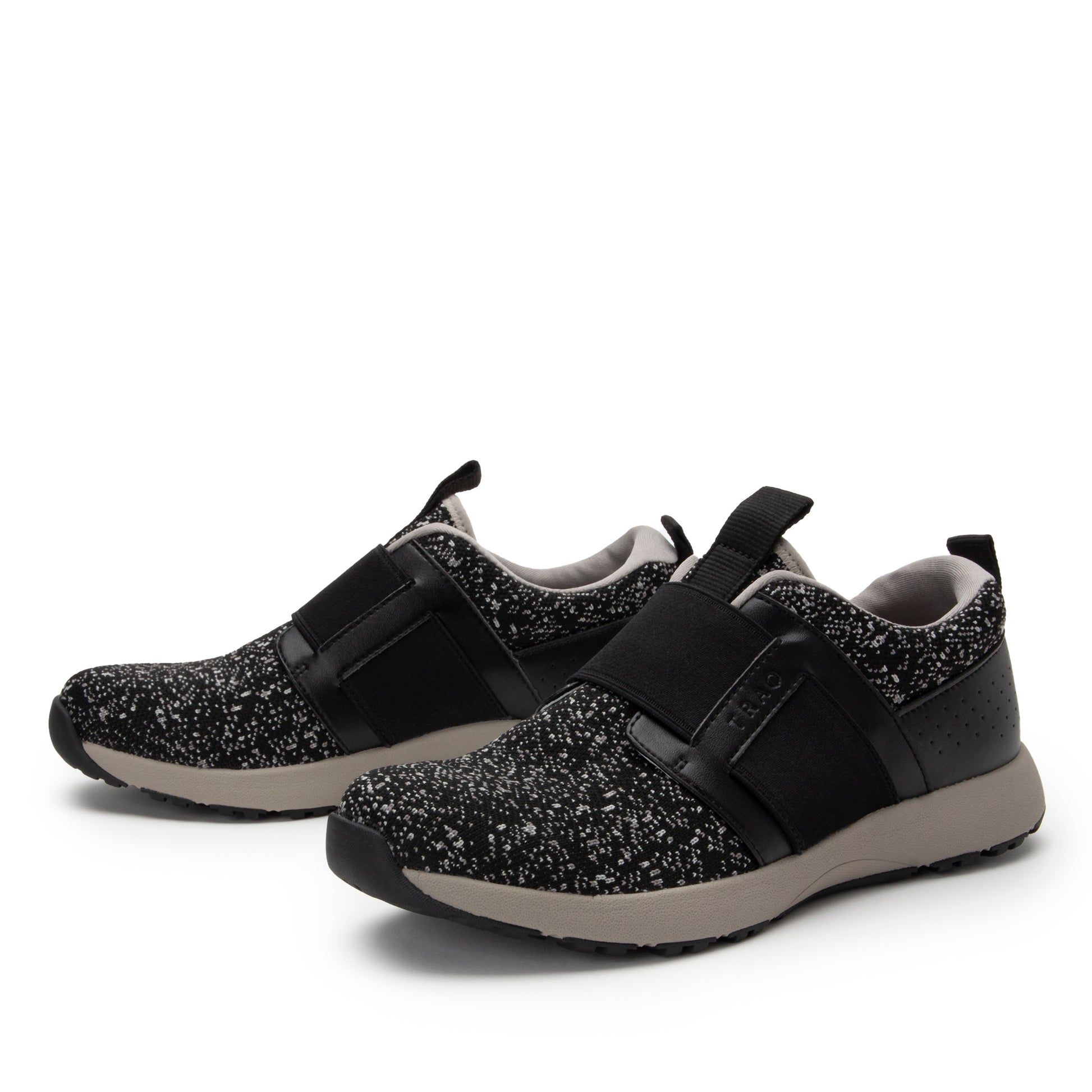 Black and gray sneakers with velcro straps on a white background