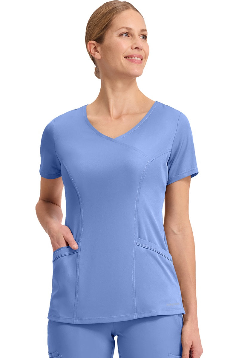 Healing Hands HH Works Madison 2525 scrub top in Ceil Blue - moisture-wicking women's v-neck scrub for healthcare professionals.
