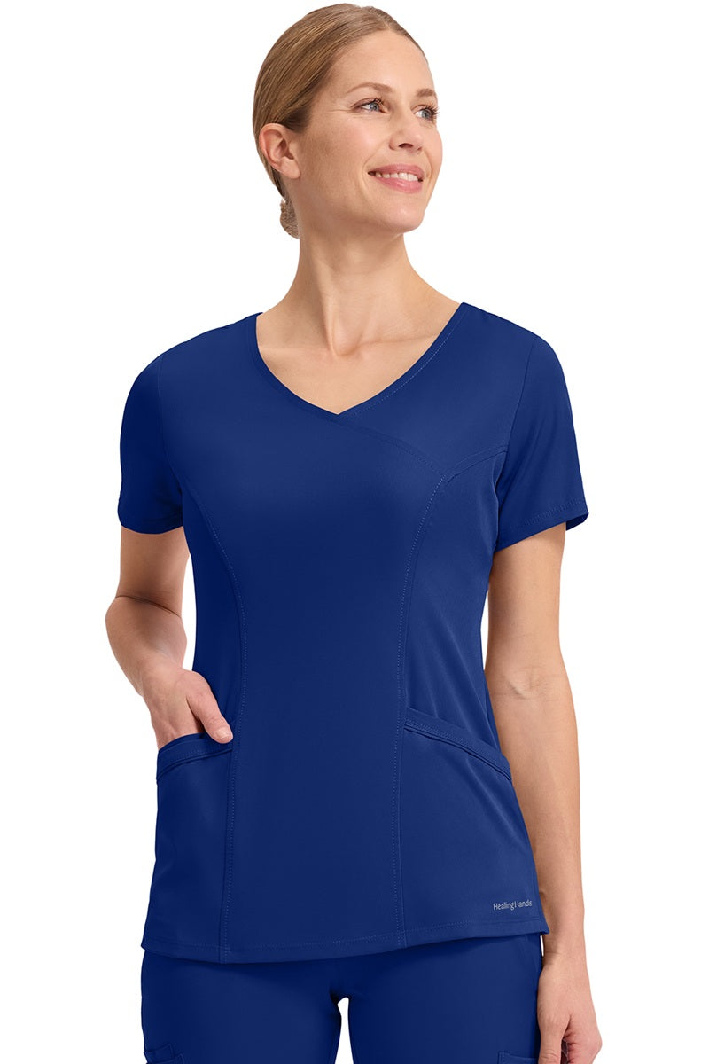 Healing Hands HH Works Madison 2525 scrub top in Galaxy Blue - premium women's mock wrap scrub with multiple pockets.