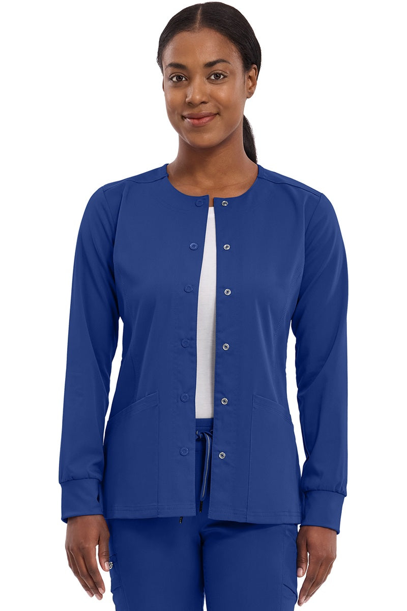 Women's Healing Hands Purple Label Daisy scrub jacket style 5063 in galaxy blue with snap front closure, zipper pockets, and 2-way stretch moisture-wicking fabric for nurses and healthcare professionals.