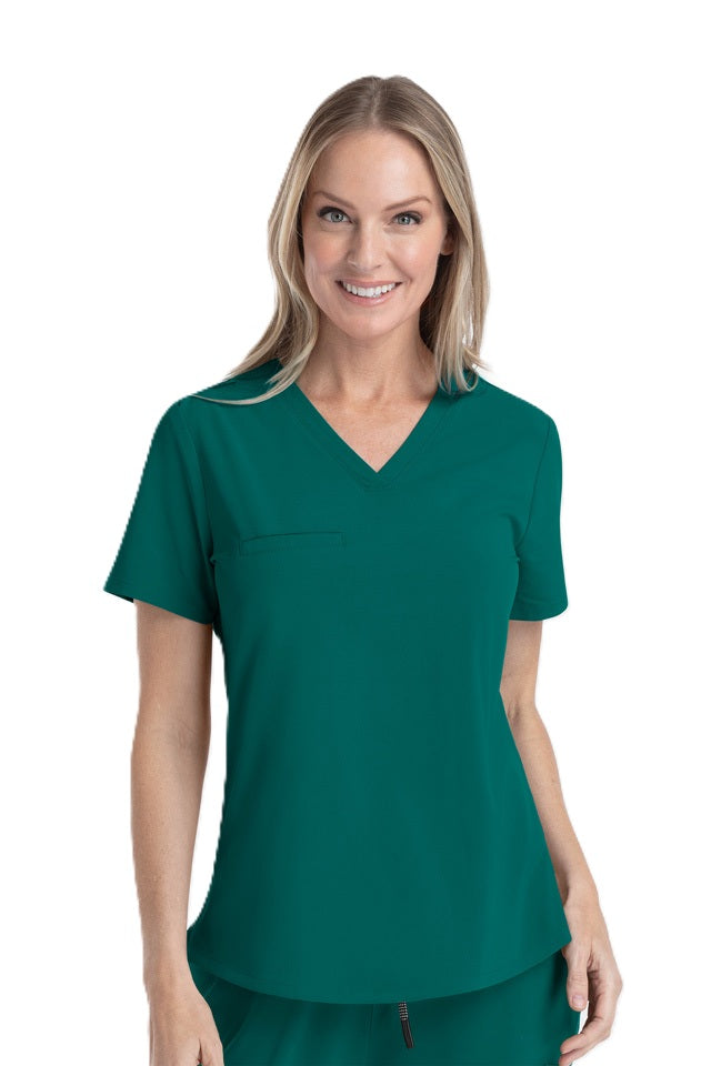 Hunter green V-neck medical scrub top IRG EPIC 4803 with versatile tuck-in or wear-out styling for healthcare workers.