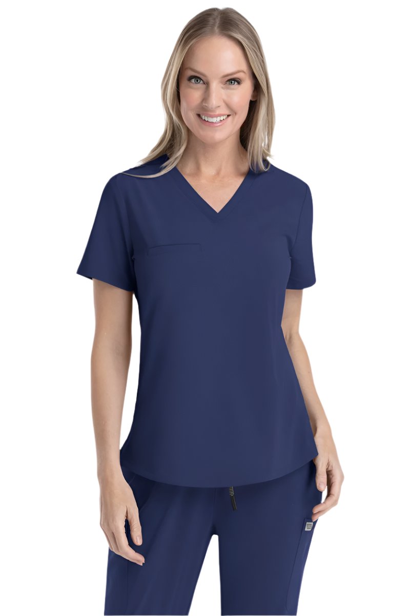 Navy blue V-neck scrub top IRG EPIC 4803 with professional fit and moisture-wicking performance for medical professionals.