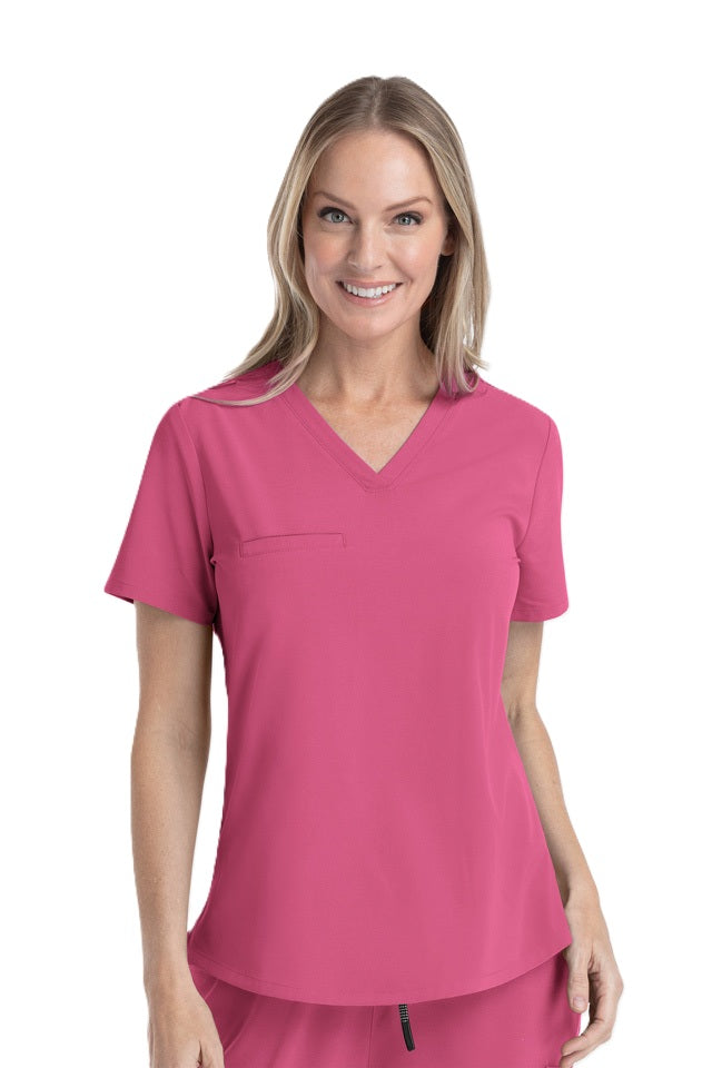 Shocking pink V-neck scrub top IRG EPIC 4803 with tuck-in design and moisture-wicking technology for clinical environments.