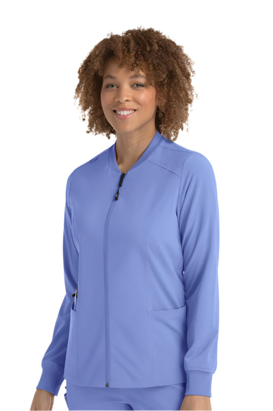 IRG EPIC 4812 women's scrub jacket in ceil blue with zipper front, princess seams, and side pockets.