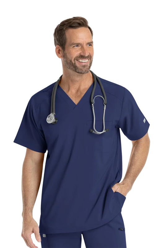 IRG Men's EPIC 4851 navy blue scrub top with stretch performance fabric for nurses doctors and medical staff.
