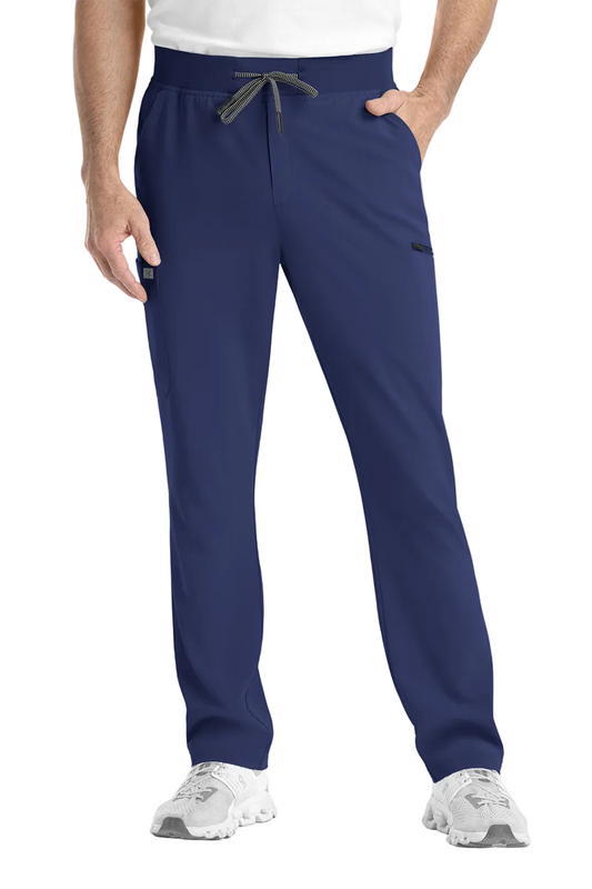 IRG EPIC 9851 men's scrub pants in navy blue with tapered athletic fit, yoga waistband, and zipper pockets for healthcare professionals.