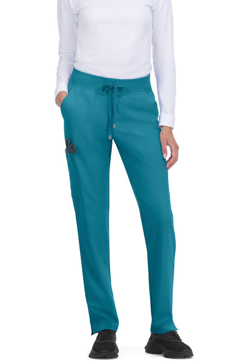 koi Cureology Atria C701 women's tapered leg scrub pants in teal blue with professional tapered fit and 7 functional pockets for clinical settings.