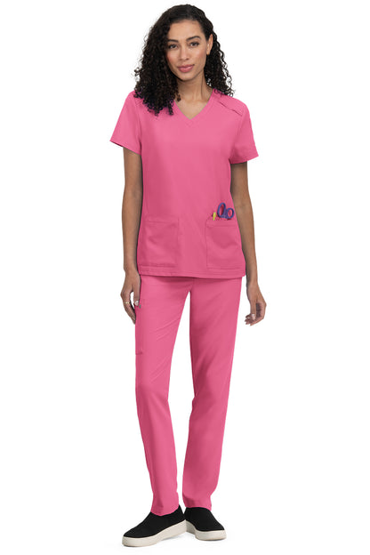 Koi Cureology Cardi C101 carnation pink women's scrub top with v-neck design for medical staff.