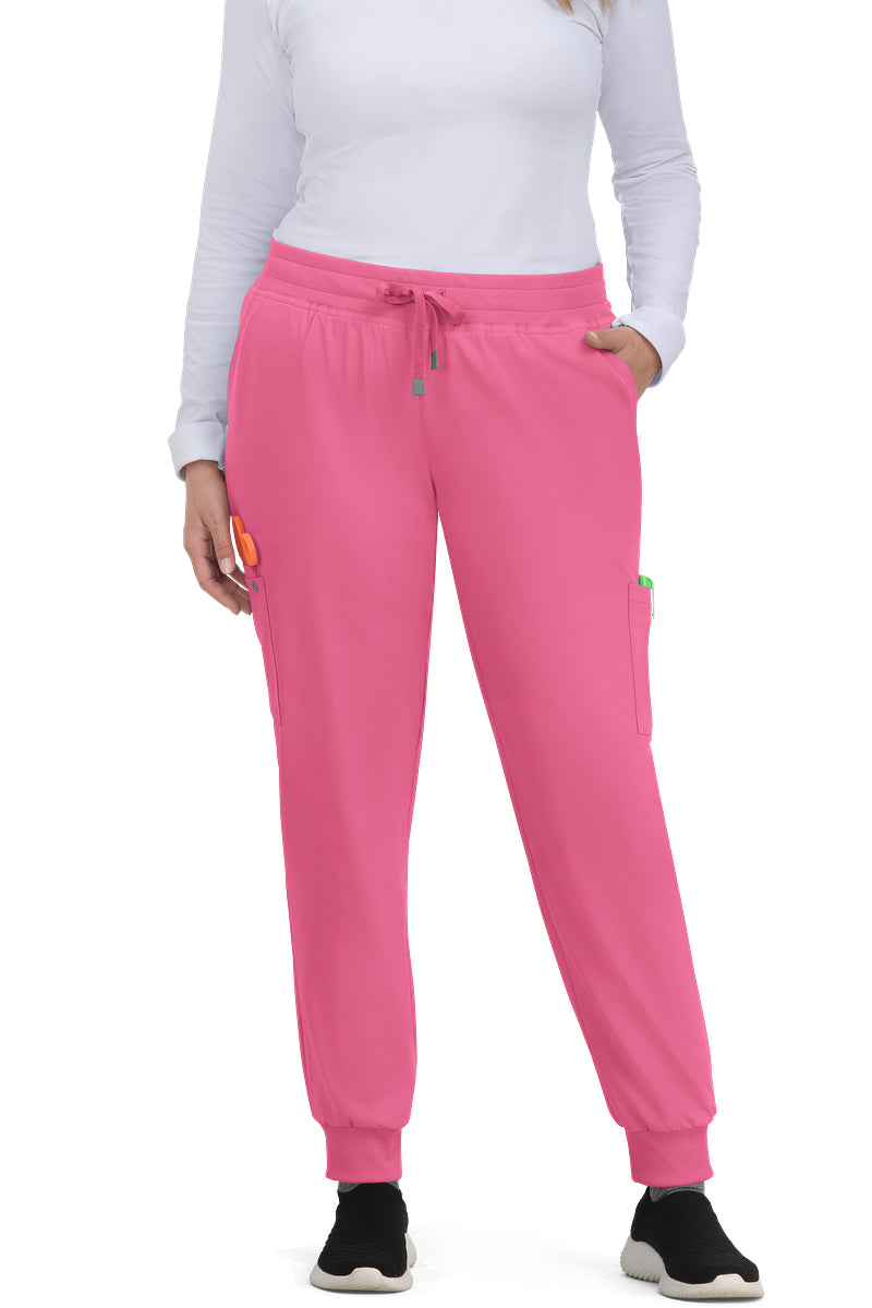 Koi Cureology C700 women's jogger scrub pants in Carnation Pink with 6 pockets, drawstring waist, and ribbed ankle cuffs - premium medical scrubs for nurses.