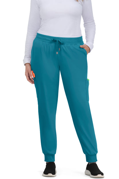 Koi Cureology C700 women's jogger scrub pants in Teal Blue with 6 pockets, drawstring waist, and ribbed ankle cuffs - premium medical scrubs for nurses.