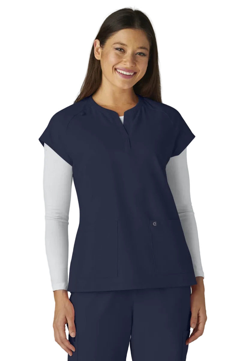 koi C102 Cureology Reese Scrub Top with soft rib-knit collar, raglan sleeves & functional pockets in Navy Blue.