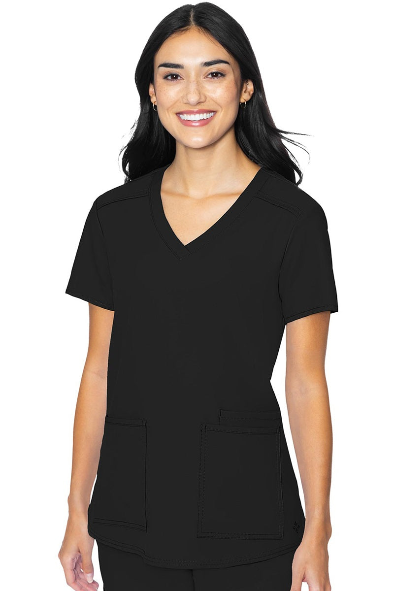 Med Couture Insight 2411 women's scrub top in black featuring classic v-neck, 3 functional pockets, and box pleat design for healthcare professionals
