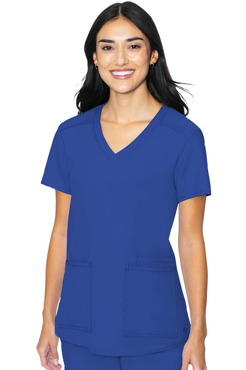 Med Couture Insight 2411 women's scrub top in royal blue featuring classic v-neck, 3 functional pockets, and box pleat design for healthcare professionals
