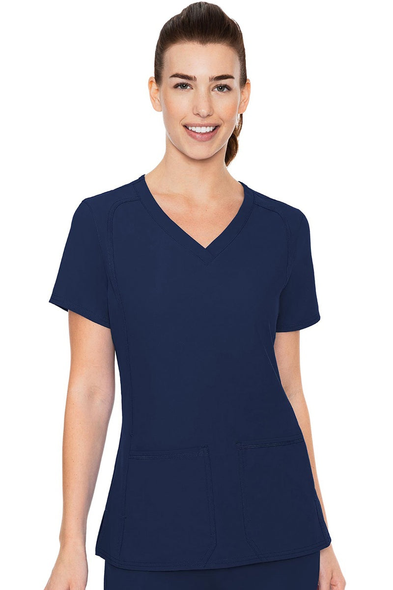 Med Couture Insight 2468 scrub top in navy blue - women's v-neck medical uniform with side pockets and moisture-wicking fabric.
