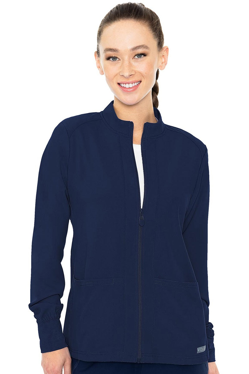 Med Couture Insight 2660 zip front scrub jacket in navy blue with soft knit cuffs and front pockets for healthcare professionals.