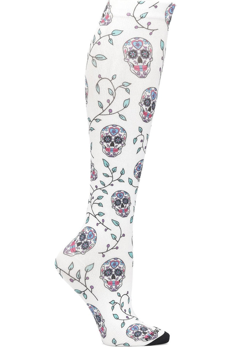 Nurse Mates 360° seamless compression socks 12-14 mmHg in sugar skulls Day of the Dead pattern with colorful calavera design, regular calf fit, healthcare professional grade support hosiery