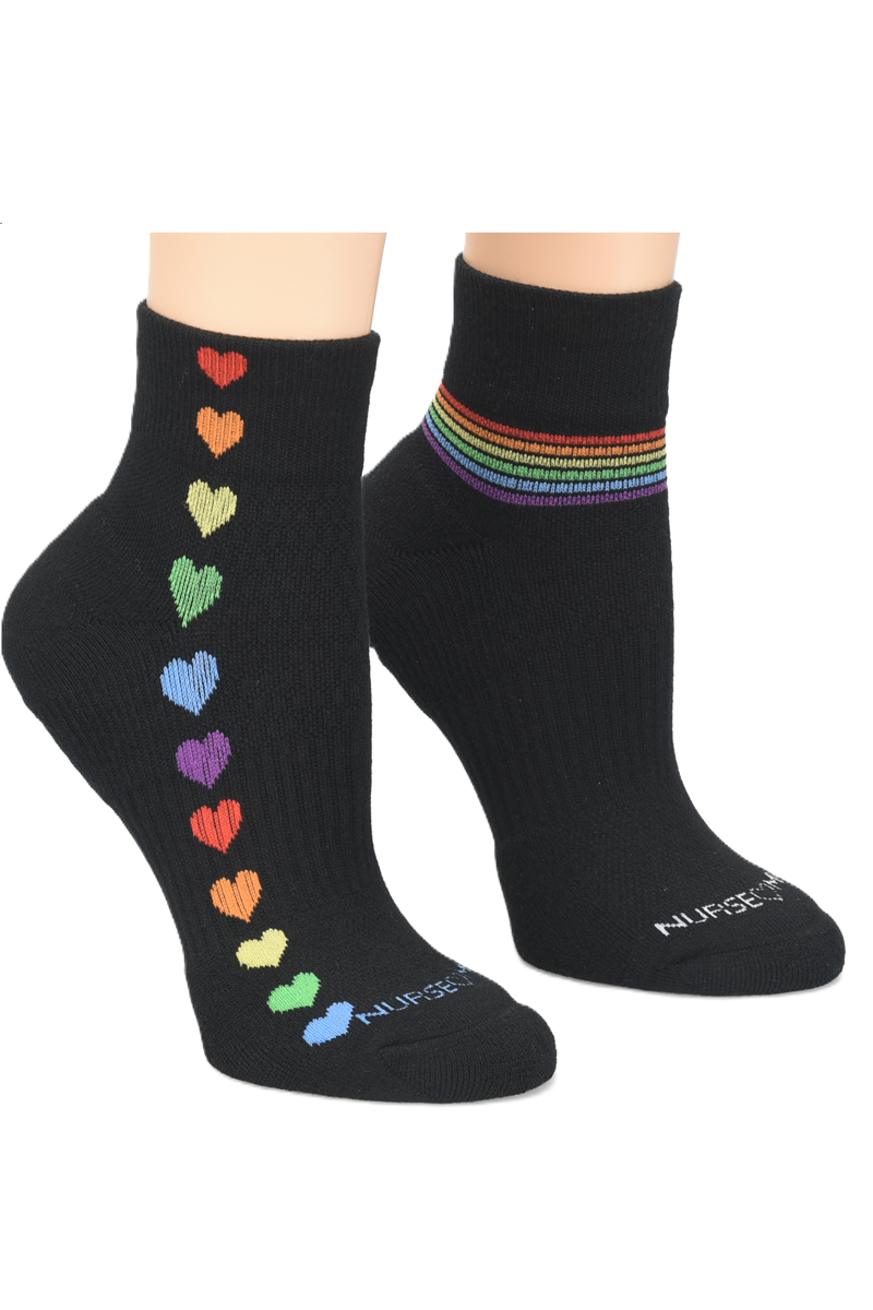 Nurse Mates quarter-top compression socks in rainbow hearts pattern | Mild 15mmHg graduated compression | Arch cushioning and moisture-wicking TruDry technology | Professional medical footwear for nurses and healthcare workers