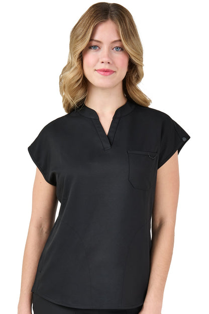 Black Zavate Studio Dynamic scrub top with stand collar and dolman sleeves, showing chest pocket and triple-stitch construction - premium healthcare apparel.