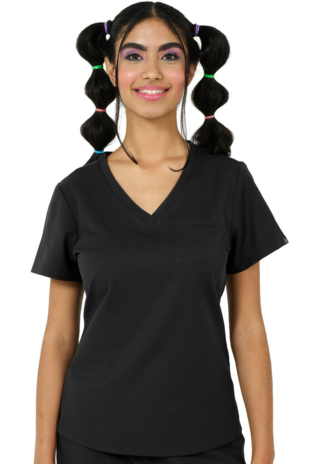 Zavate Studio Elevate scrub top in black featuring modern tuck-in design, chest pocket with triple needle stitching, and elastic bungee loop for healthcare professionals.