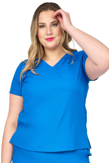 Zavate Studio Elevate scrub top in royal blue with premium comfort design, durable chest pocket, and sleek silhouette for doctors, nurses, and healthcare workers.