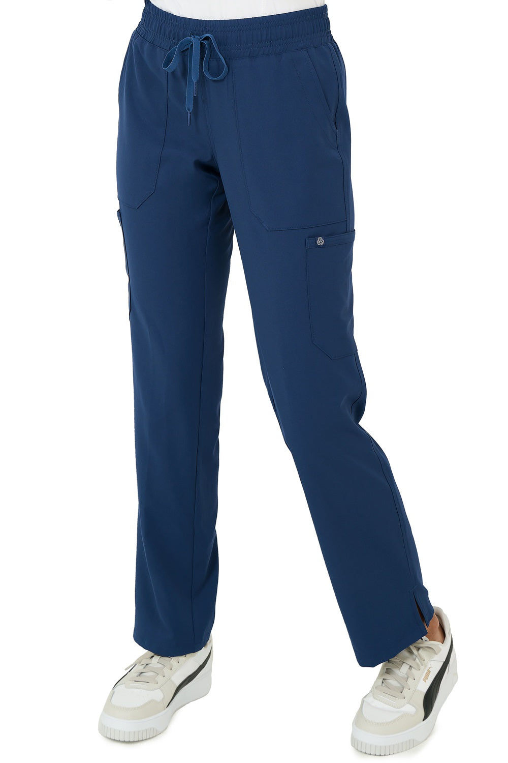 Zavate Studio Energy poly stretch scrub pants in navy blue showing straight leg design and functional pocket placement.