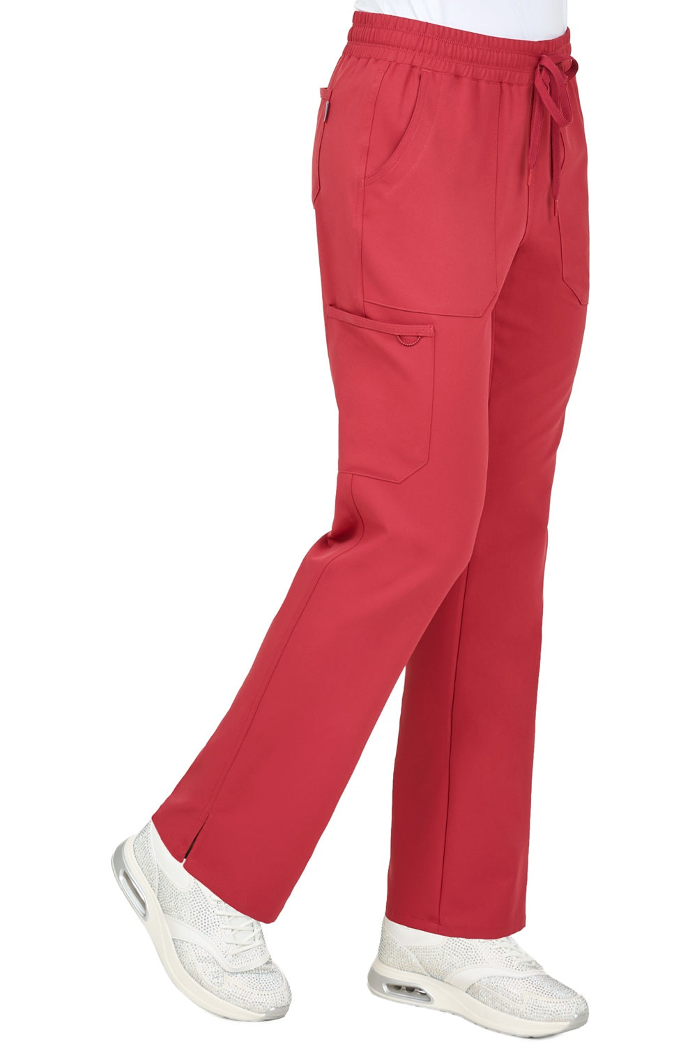 Terracotta orange scrub pants featuring poly stretch material and functional pocket design for all-day comfort.
