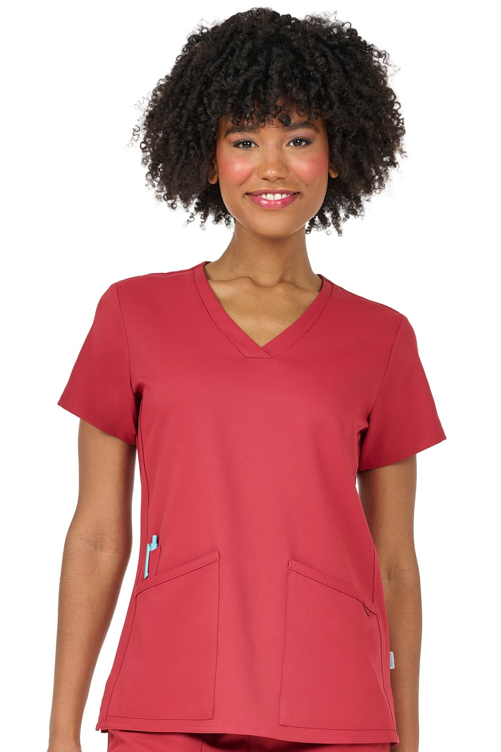 Terracotta orange Zavate Studio Focus V Neck scrub top with lightweight breathable fabric.