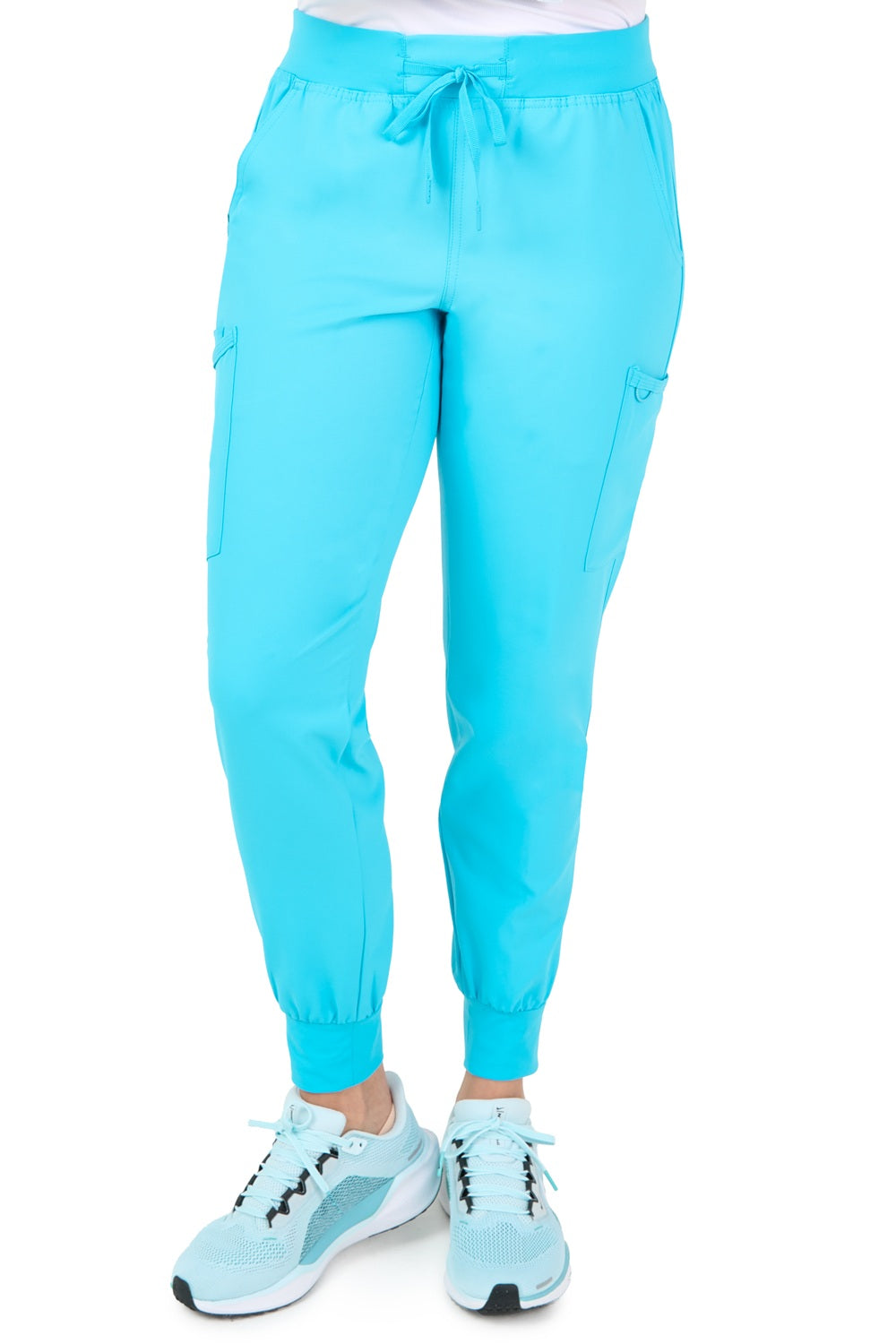 Zavate Studio Refined Jogger 3060 scrub pants in turquoise - women's jogger scrubs featuring knit cuffs, 5 pockets, and moisture-wicking fabric for nurses and medical assistants.