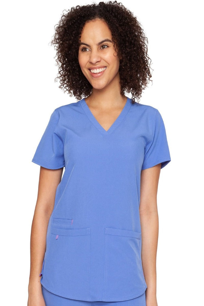 Med Couture Scrub Top Energy Serena Shirttail Hem V-neck in Ceil at Parker's Clothing and Shoes.