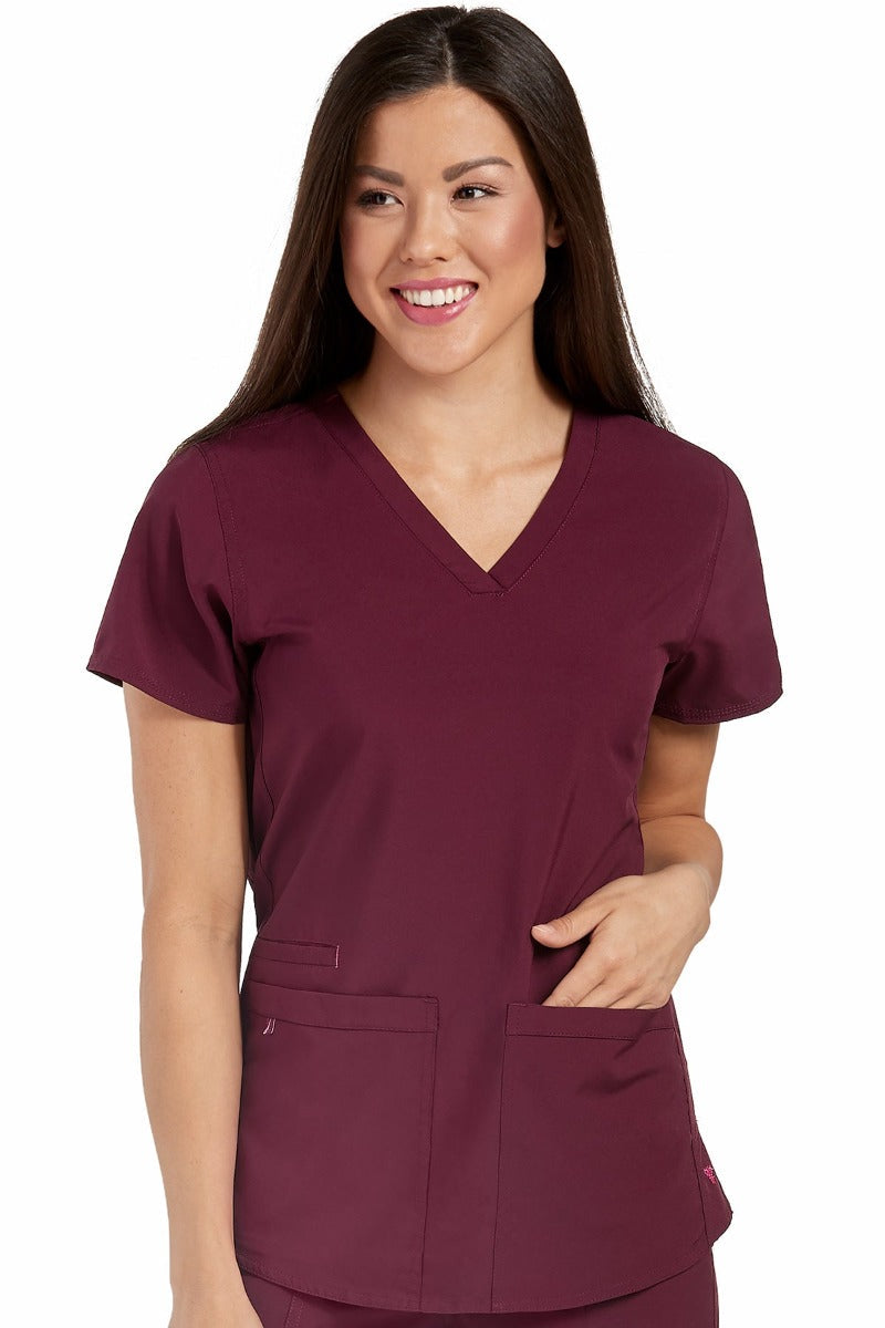 Med Couture Scrub Top Energy Serena Shirttail Hem V-neck in Wine at Parker's Clothing and Shoes.
