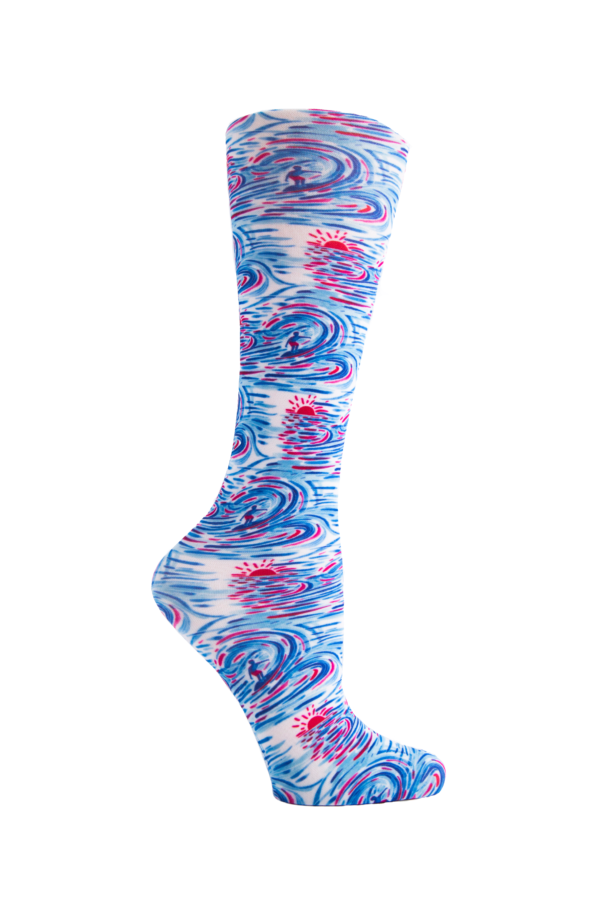 Women's knee-high wide calf compression socks in Surf's Up print - Cutieful 10-18 mmHg moderate graduated compression for nurses and healthcare workers.