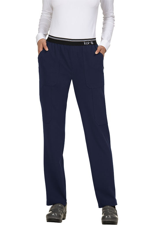 Koi Next Gen On The Run 738 scrub pants in navy blue - 4-way stretch skinny leg medical scrubs for nurses and healthcare professionals.