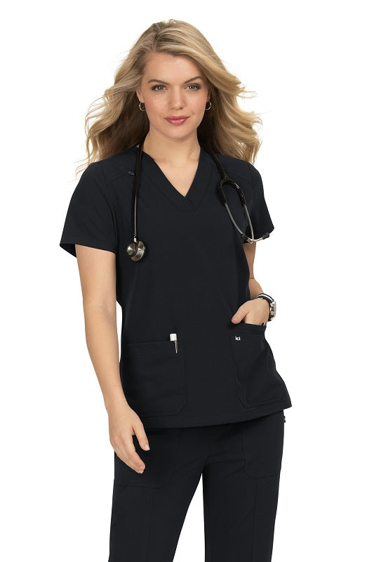 Koi Next Gen Hustle and Heart scrub top 1019 in Black - 4-way stretch medical scrub with badge loop and side slits for healthcare professionals.

