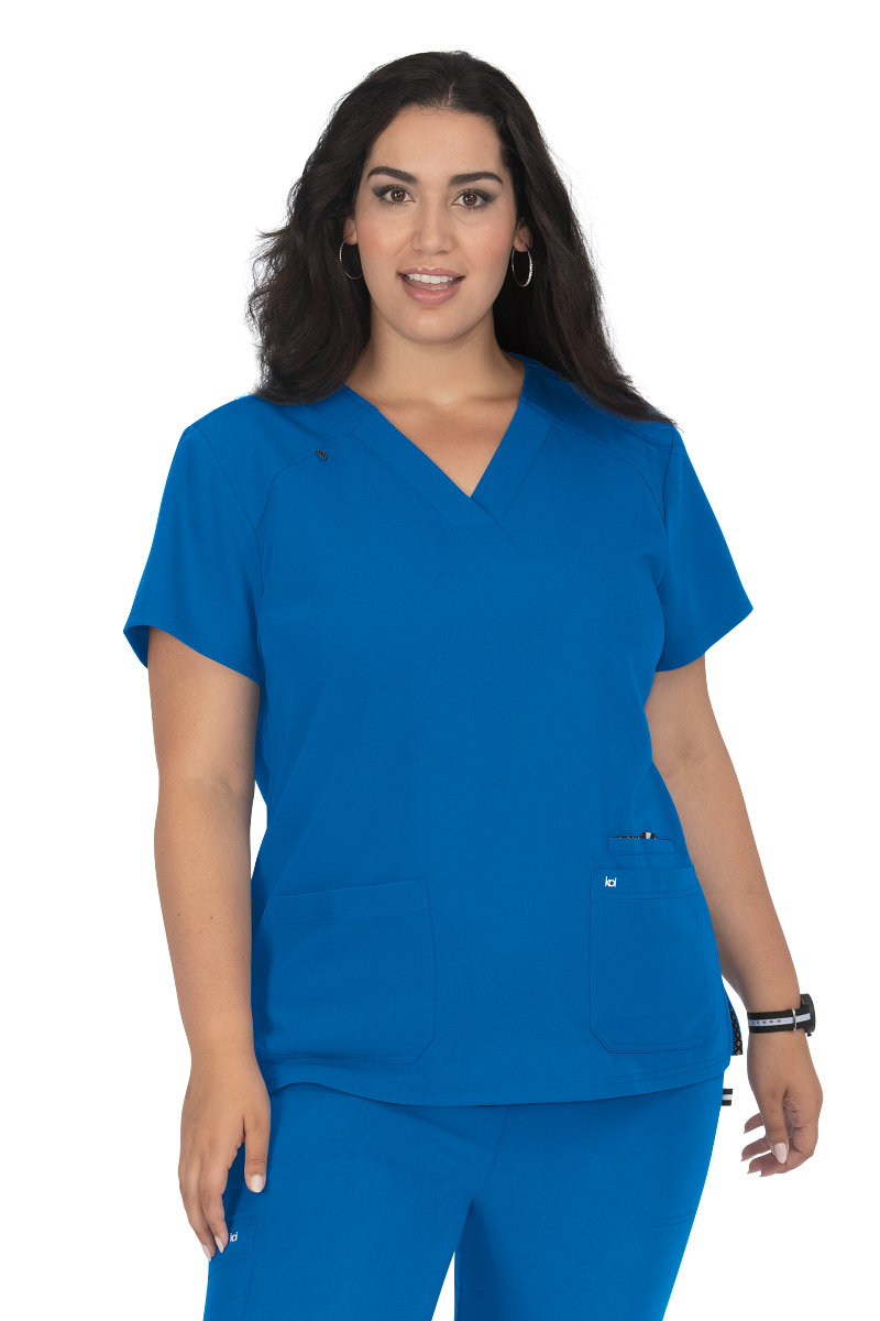 Koi Next Gen Hustle and Heart scrub top 1019 in Royal Blue - 4-way stretch fabric scrub with modern classic fit for healthcare workers.
