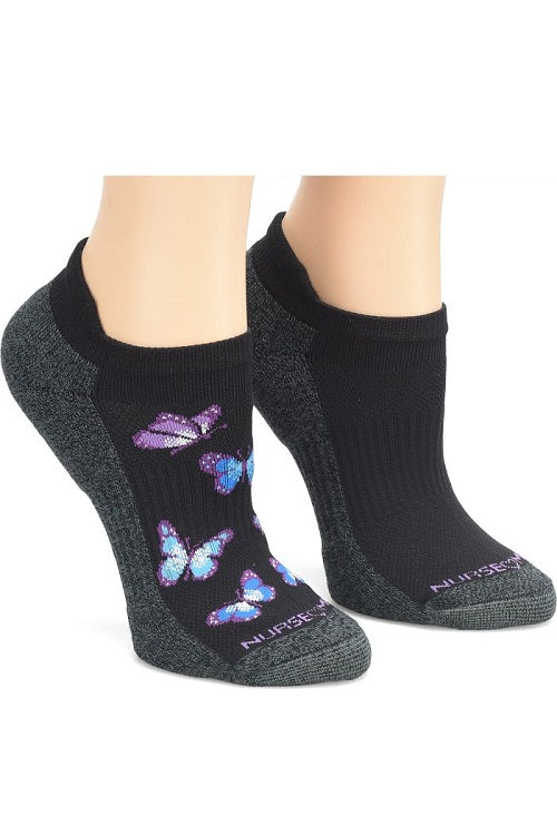Nurse Mates compression anklet socks 2-pack in Black Butterfly pattern, 15mmHg mild compression support with arch cushioning and antimicrobial TrueDry technology for healthcare professionals.
