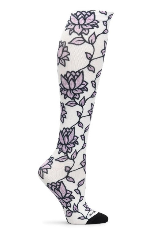 Nurse Mates 360° seamless compression socks 12-14 mmHg in lavender lotus purple floral pattern, regular calf fit, healthcare professional grade support hosiery with botanical design